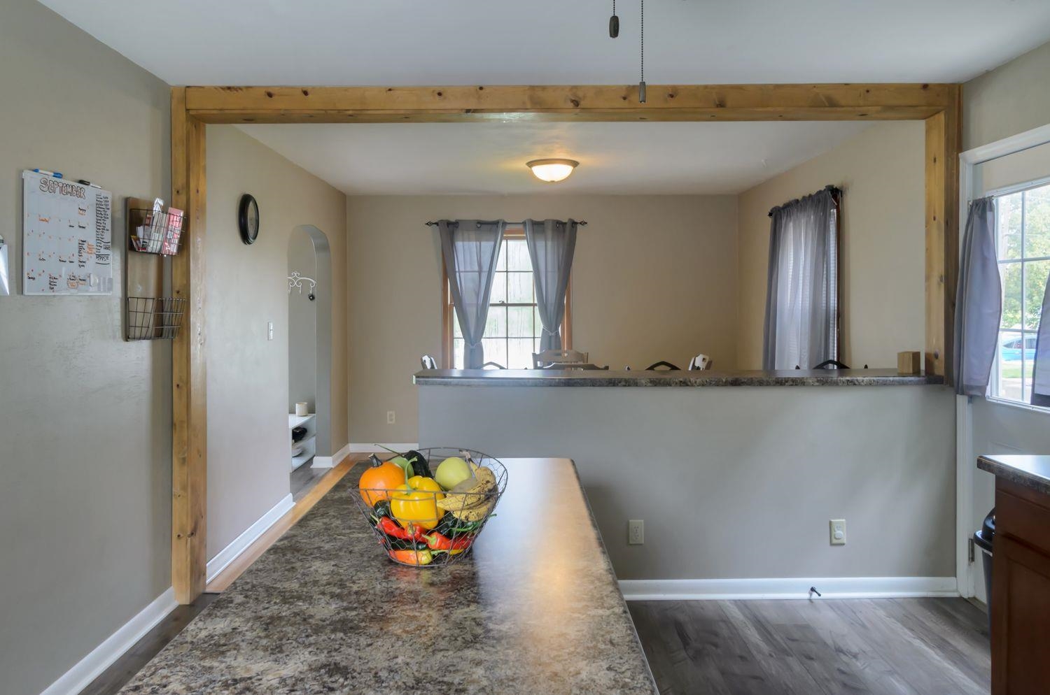736 East 3rd Street Dixon, IL 61021 - Photo 9 of 29 a bathroom with a tub and mirror