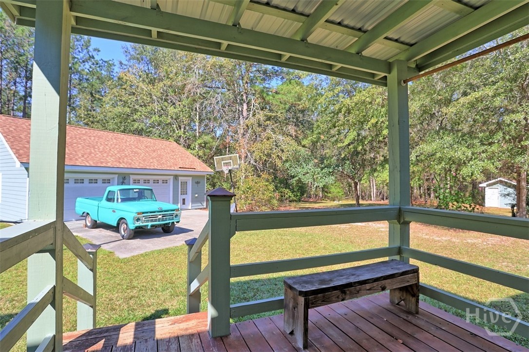 205 Dekle Road South Register, GA 30452 - Photo 36 of 55 Covered Porch showing 2 car detached garage