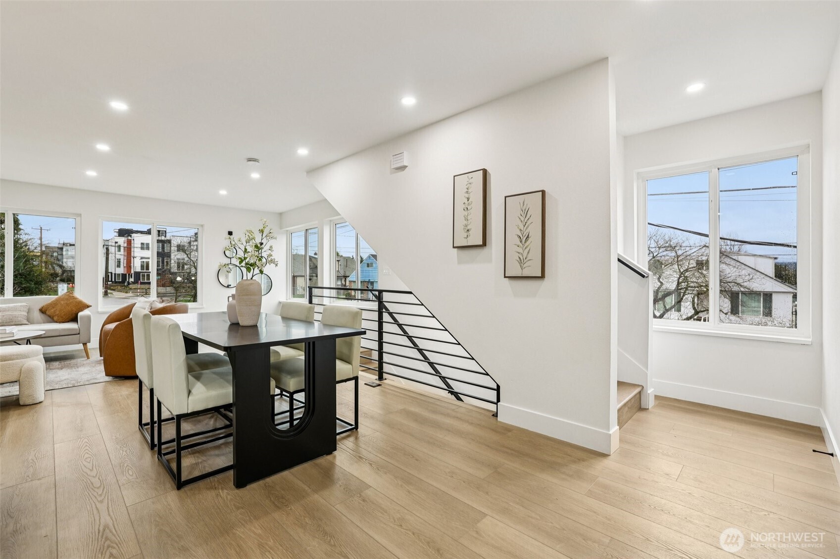 7719 Renton Avenue South, Unit A Seattle, WA 98118 - Photo 12 of 35 a living room with furniture and wooden floor