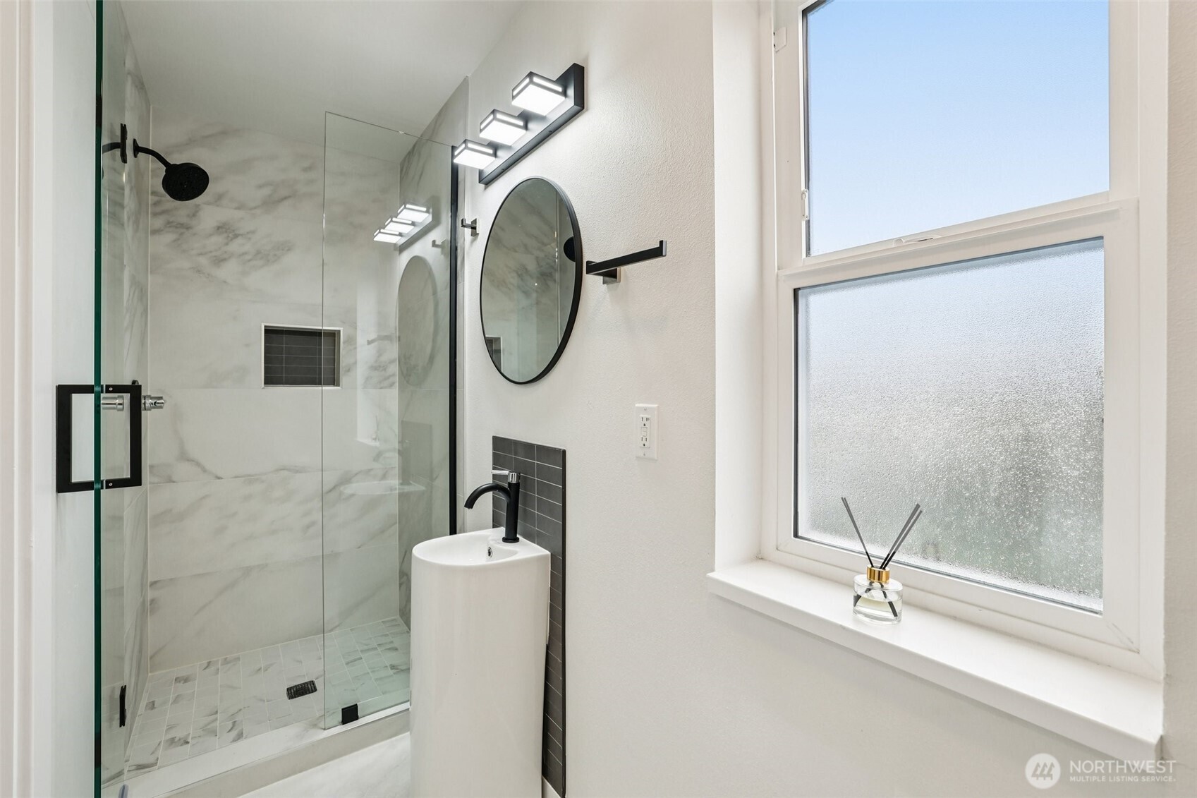 7719 Renton Avenue South, Unit A Seattle, WA 98118 - Photo 19 of 35 a bathroom with a shower