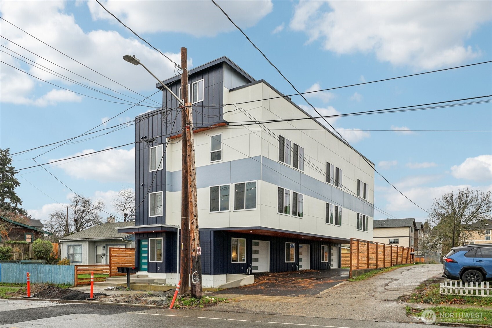 7719 Renton Avenue South, Unit A Seattle, WA 98118 - Photo 2 of 35 a view of a building with a street