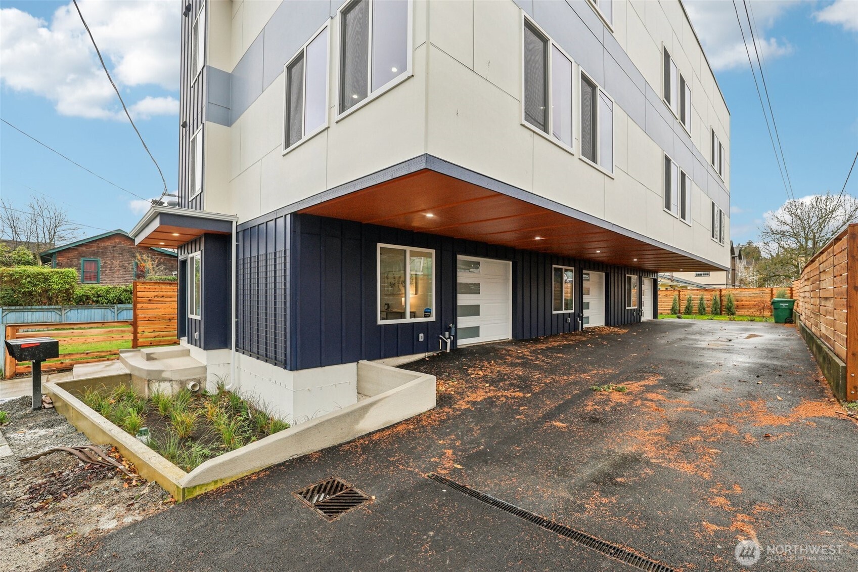 7719 Renton Avenue South, Unit A Seattle, WA 98118 - Photo 4 of 35 a view of a building with large windows