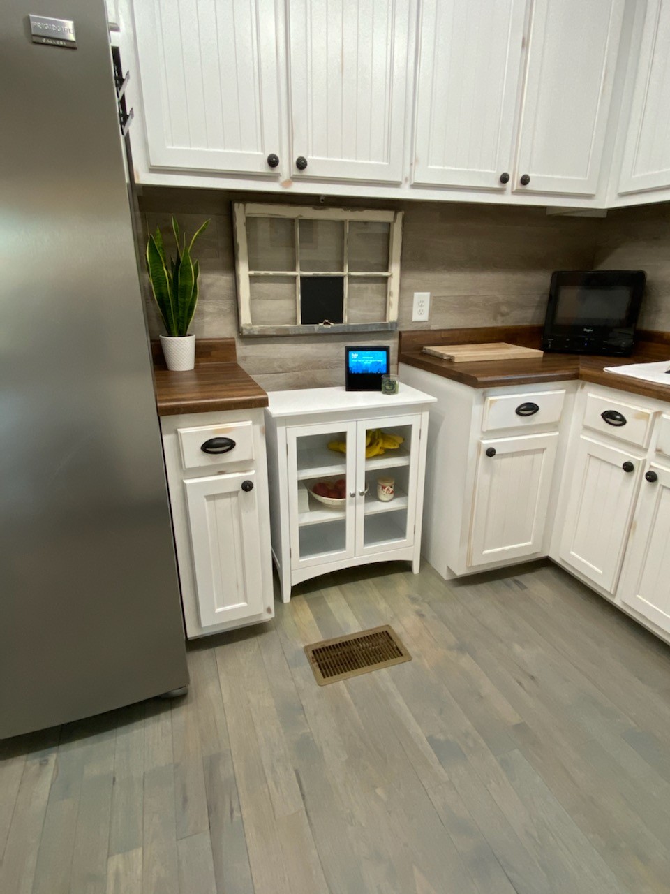 5620 Hargrove Road Franklin, TN 37064 - Photo 33 of 49 a kitchen with stainless steel appliances granite countertop a stove a sink and a microwave