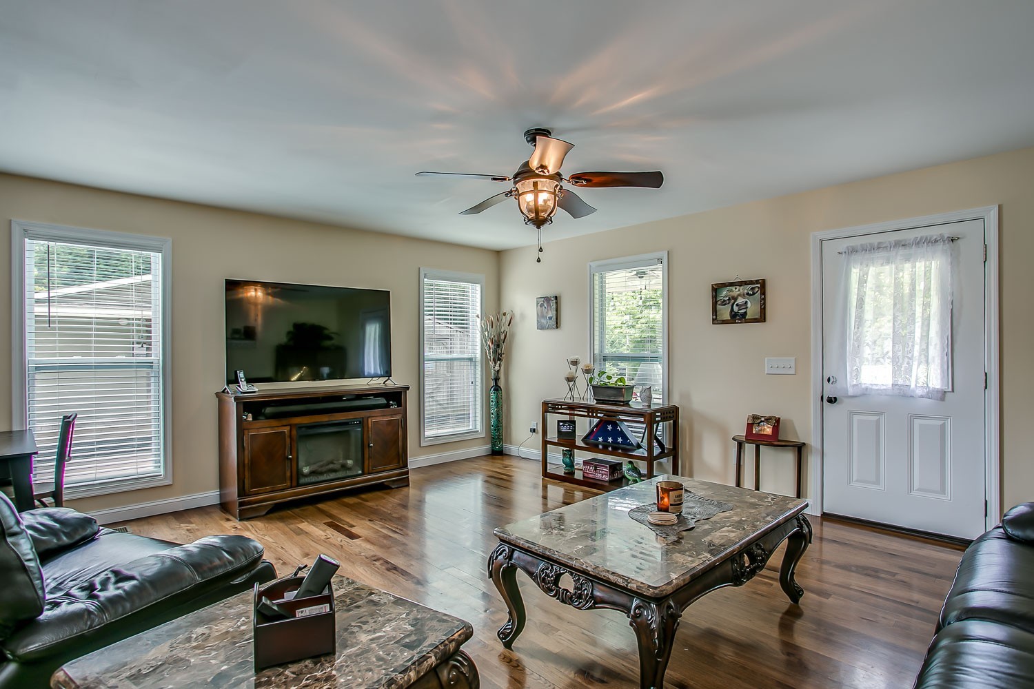 5620 Hargrove Road Franklin, TN 37064 - Photo 7 of 49 a living room with furniture and a flat screen tv