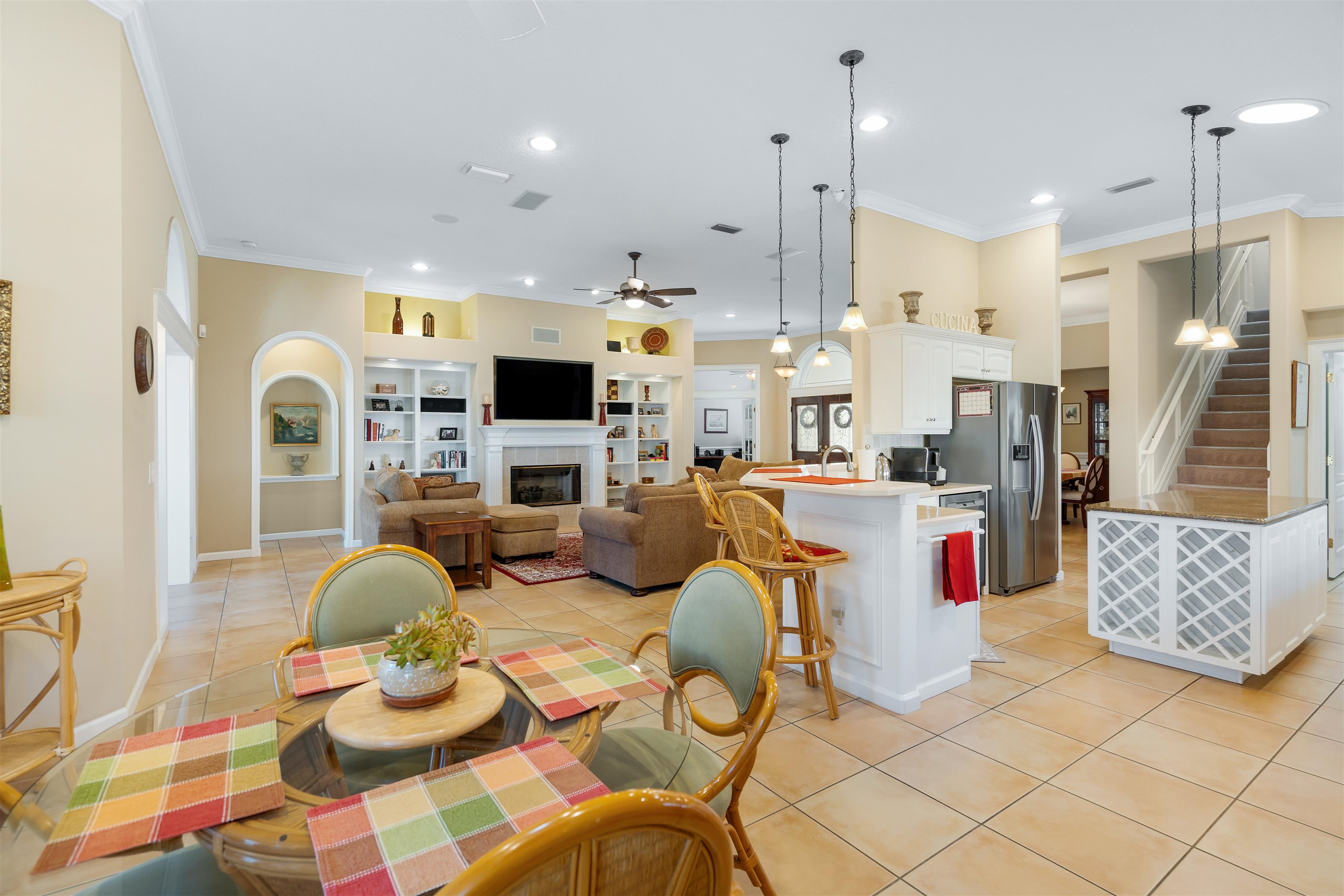 314 Fiddlers Point Drive St. Augustine, FL 32080 - Photo 17 of 54 a very nice looking dining room with kitchen island furniture and a view of kitchen