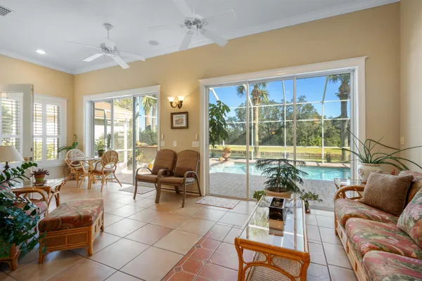 a view of a backyard with sitting area