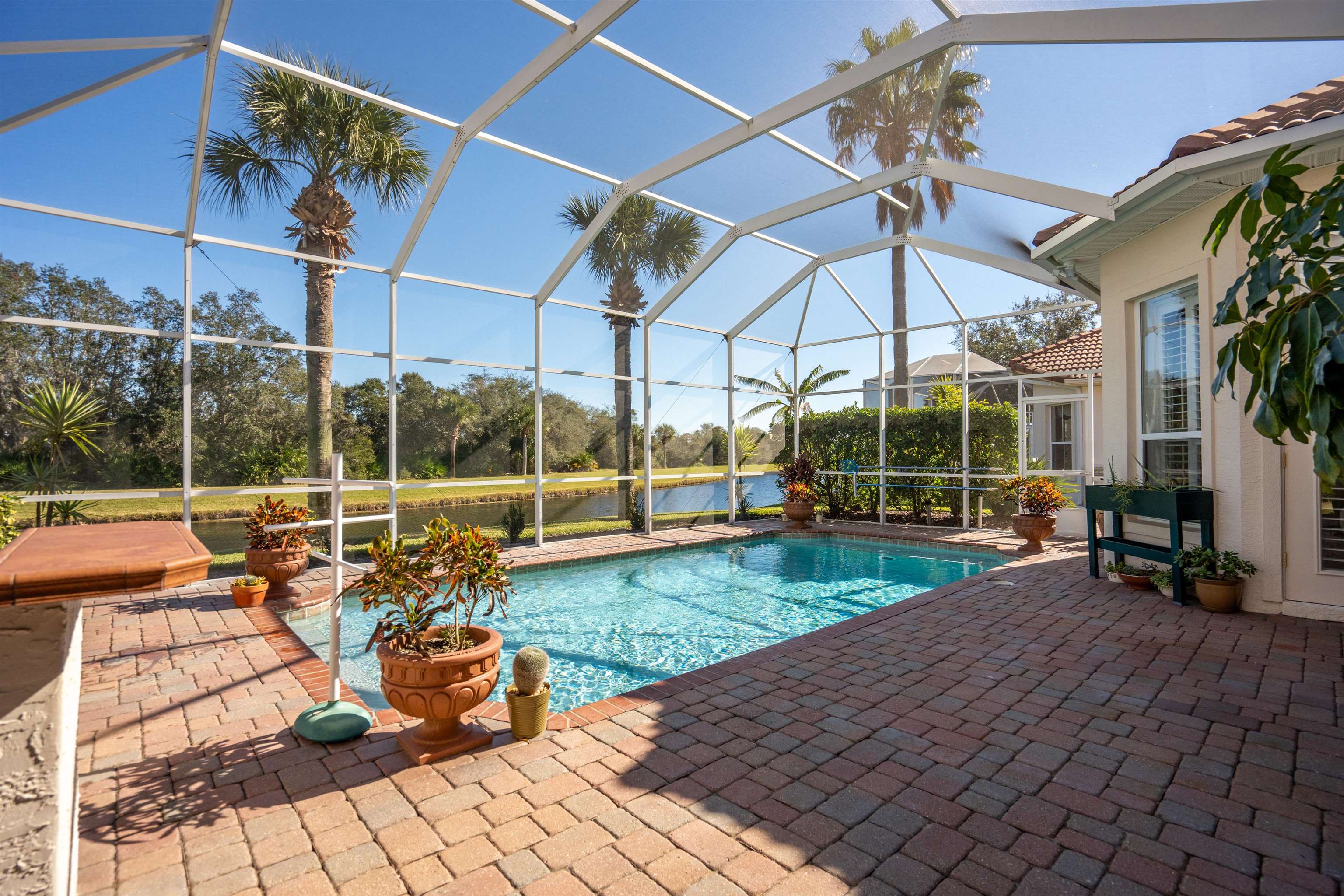 314 Fiddlers Point Drive St. Augustine, FL 32080 - Photo 21 of 54 a view of a backyard with sitting area