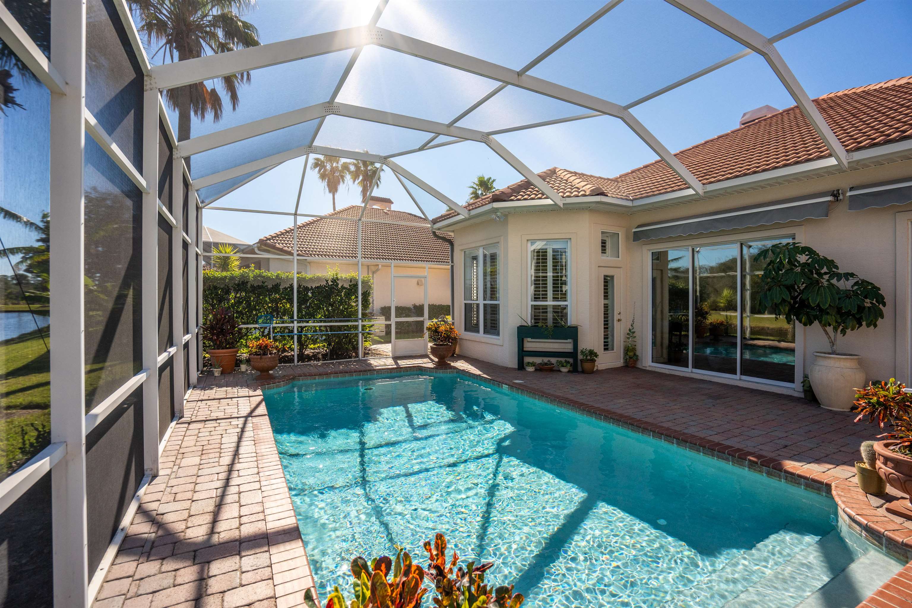 314 Fiddlers Point Drive St. Augustine, FL 32080 - Photo 24 of 54 a view of outdoor space yard deck patio and swimming pool