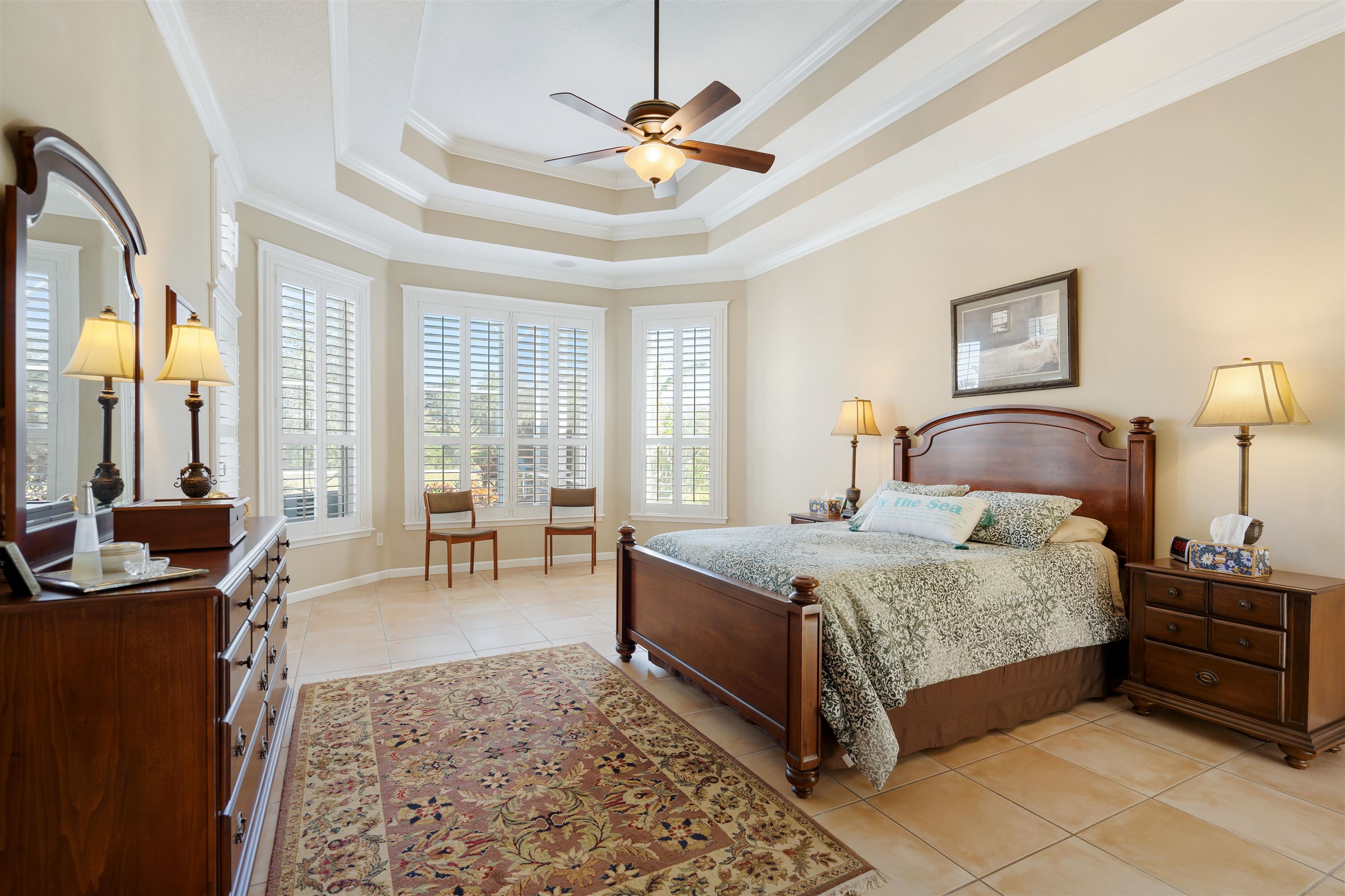 314 Fiddlers Point Drive St. Augustine, FL 32080 - Photo 26 of 54 a spacious bedroom with a bed and glass walk in closet