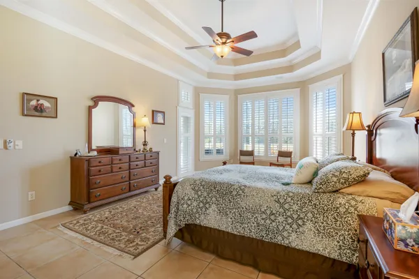 a spacious bathroom with a sink a toilet and a bathtub