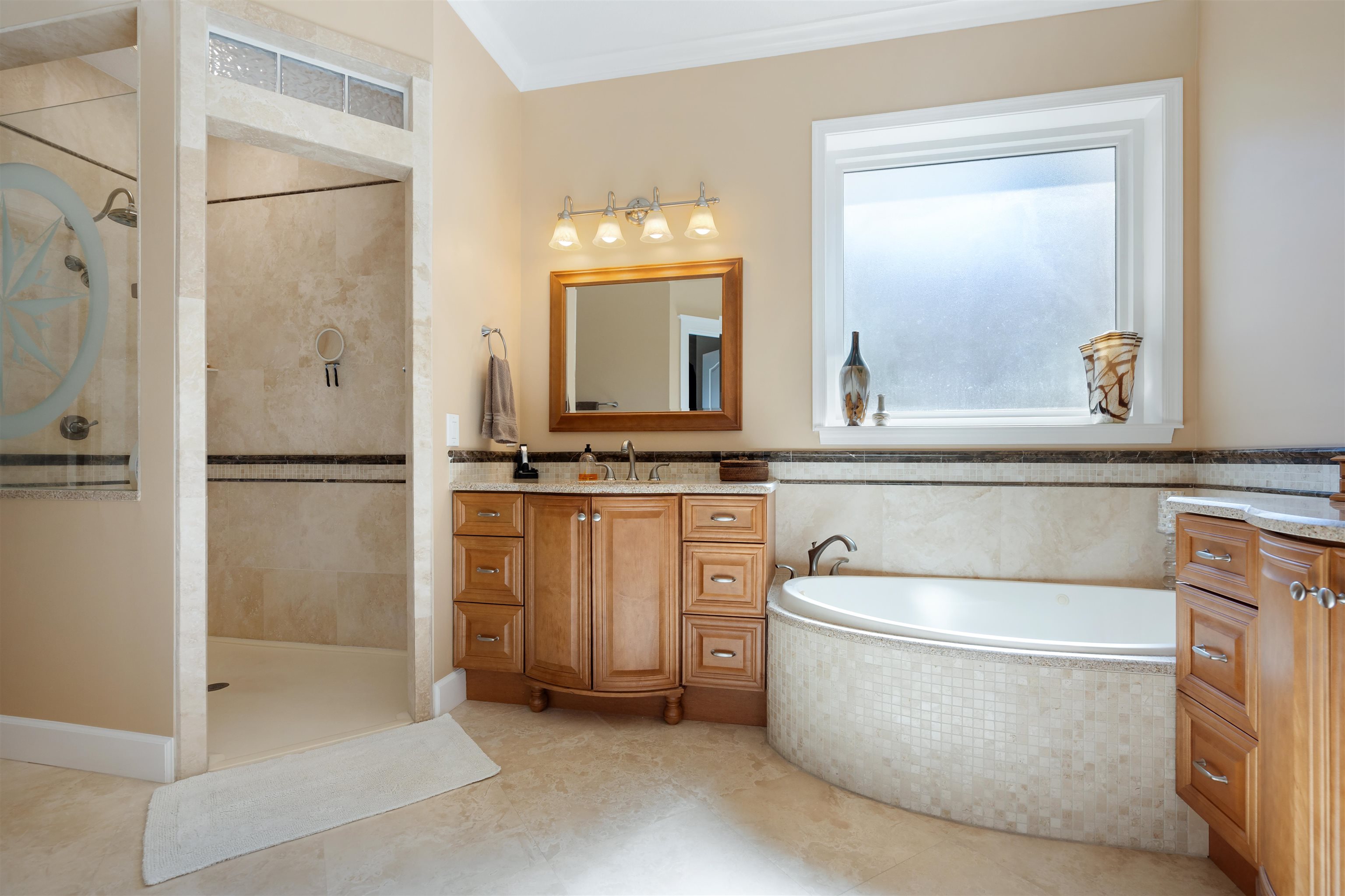 314 Fiddlers Point Drive St. Augustine, FL 32080 - Photo 29 of 54 a bathroom with a tub sink and mirror