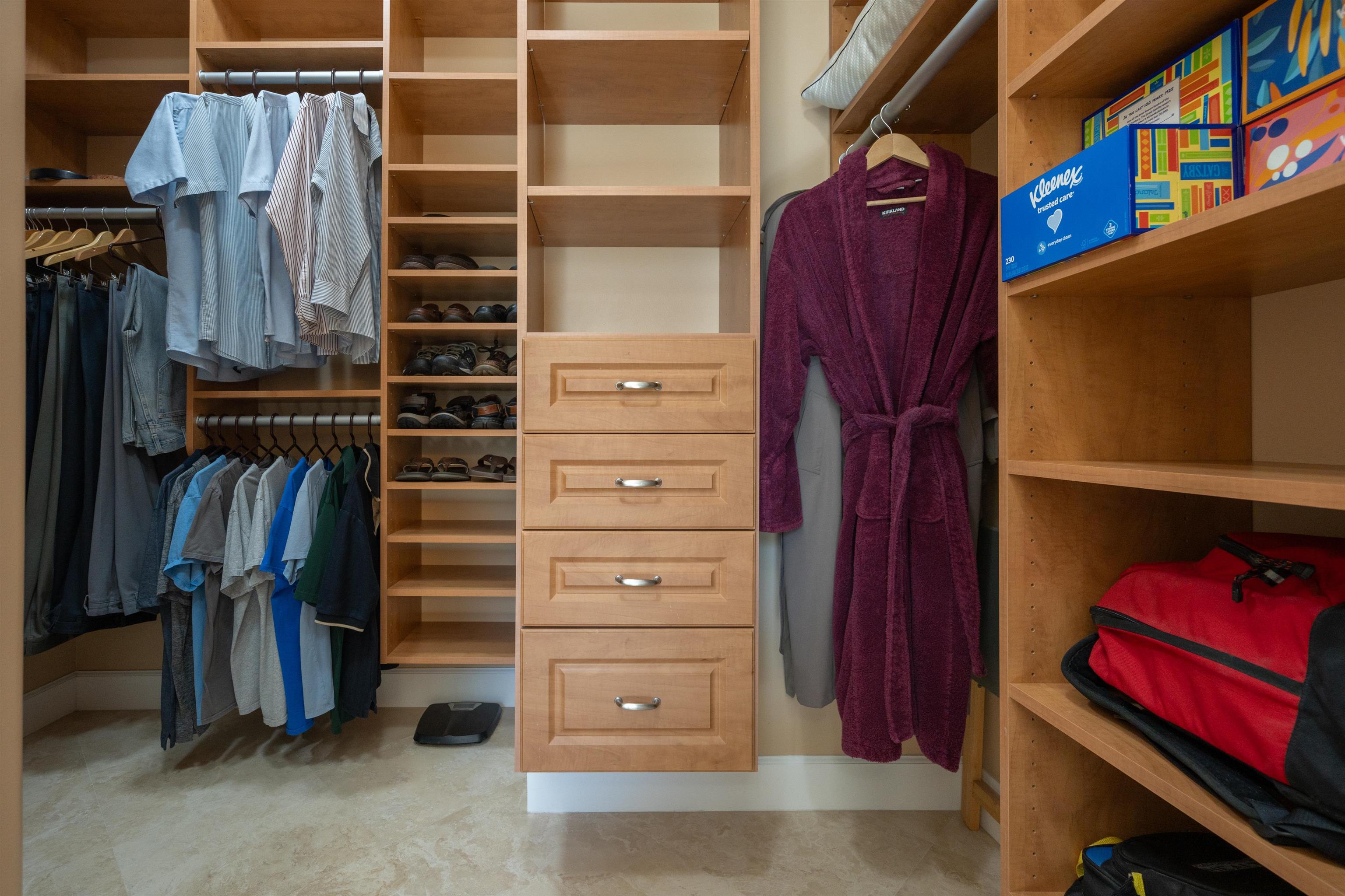 314 Fiddlers Point Drive St. Augustine, FL 32080 - Photo 32 of 54 a view of walk in closet with clothes and shoes
