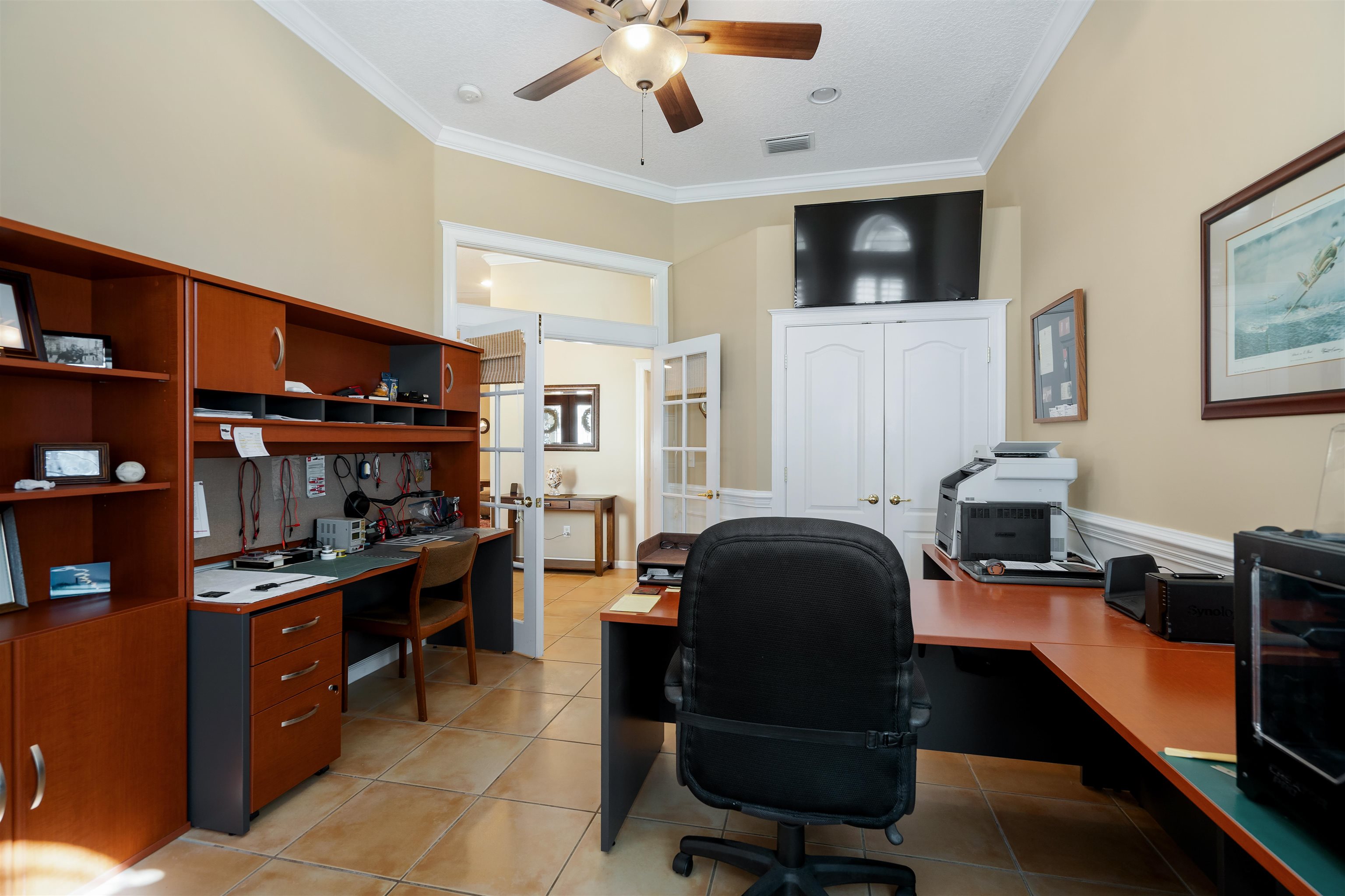 314 Fiddlers Point Drive St. Augustine, FL 32080 - Photo 34 of 54 a view of a workspace with furniture and a kitchen