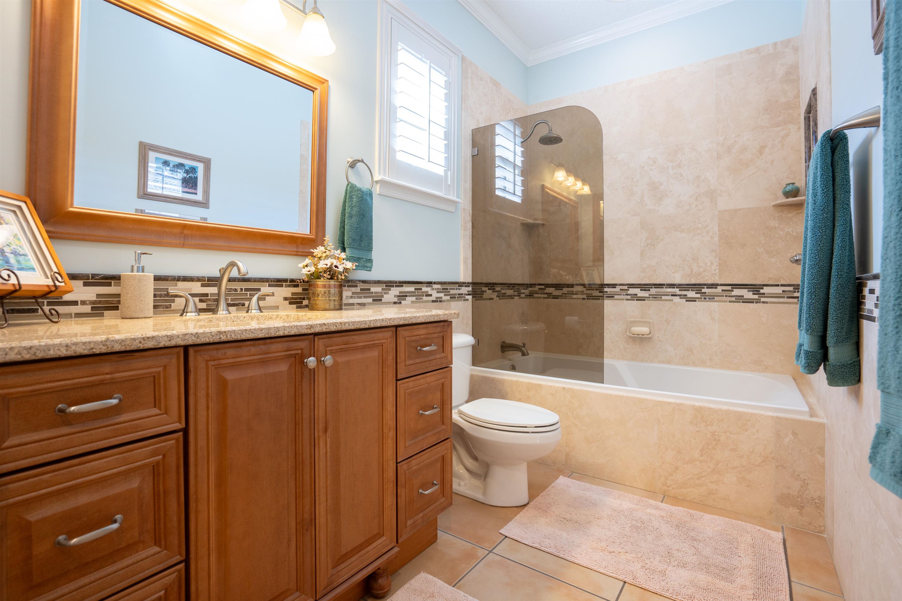 314 Fiddlers Point Drive St. Augustine, FL 32080 - Photo 35 of 54 a bathroom with a sink toilet and shower