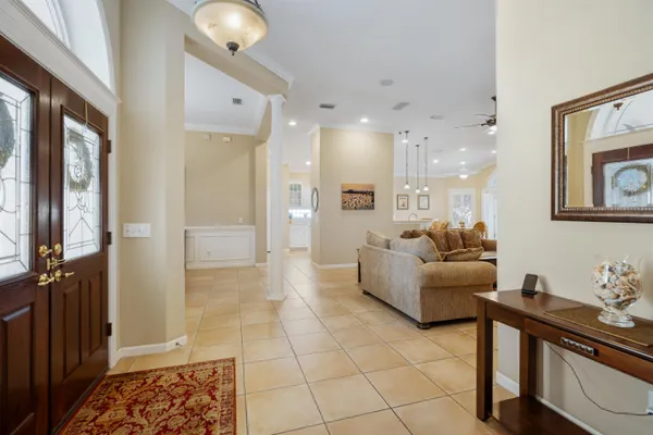 a living room with furniture fireplace and a flat screen tv