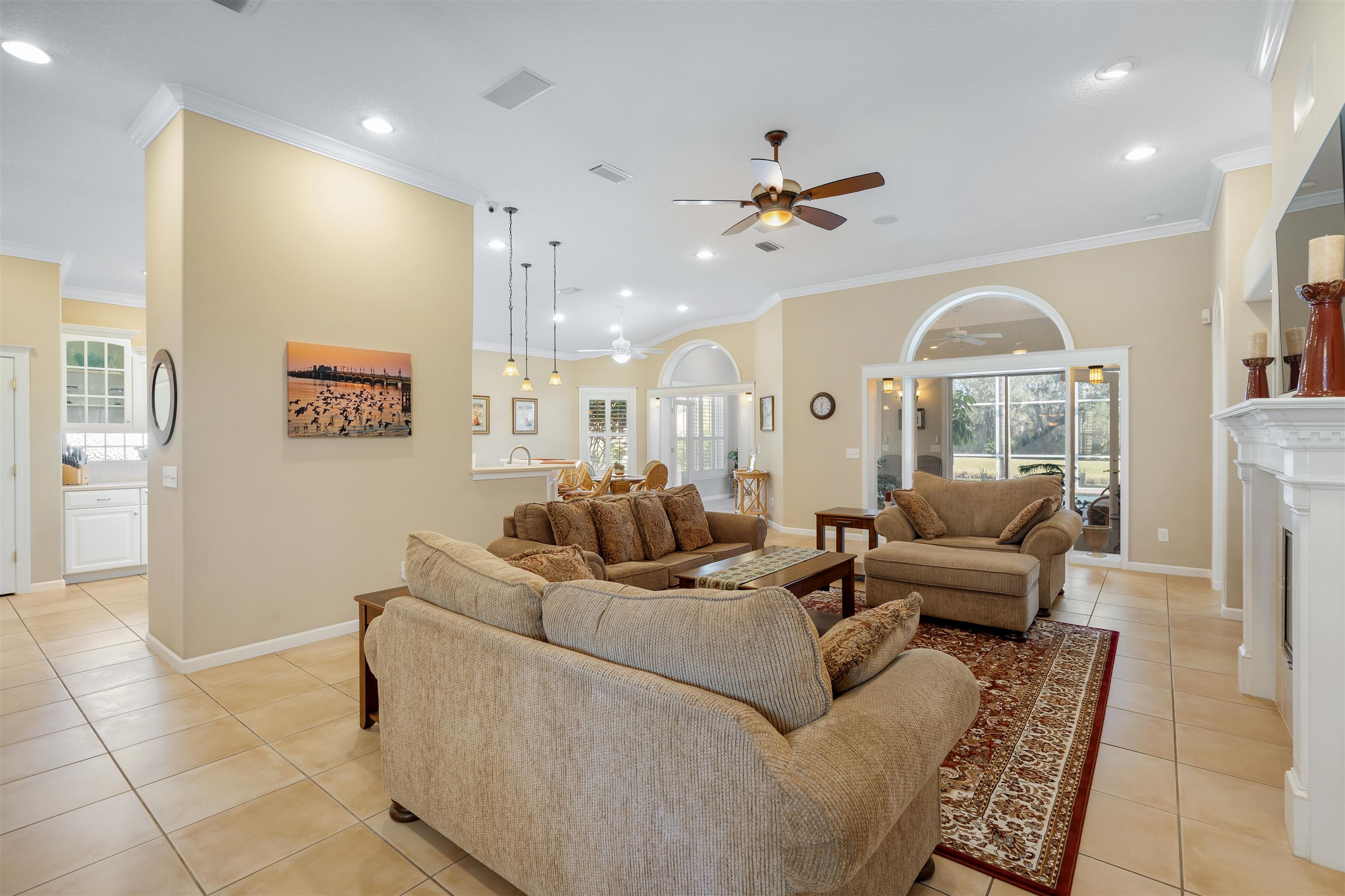 314 Fiddlers Point Drive St. Augustine, FL 32080 - Photo 9 of 54 a living room with furniture and a large window