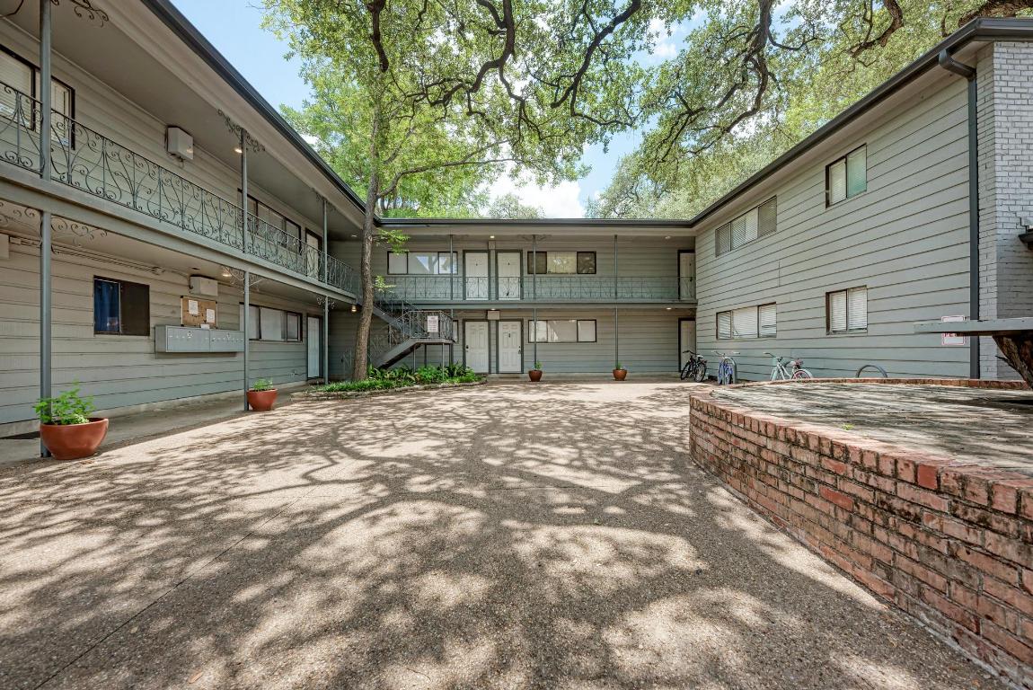 803 West 28th Street, Unit 102 Austin, TX 78705 - Photo 3 of 16 a view of a house with a yard