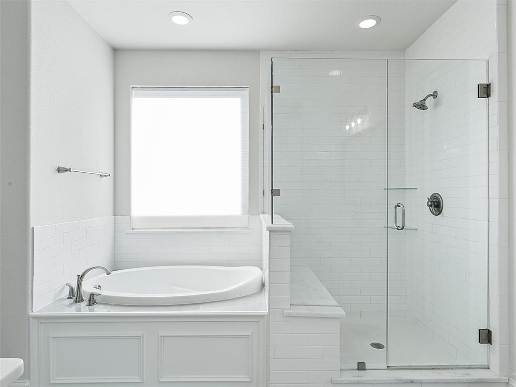 8473 Gerbera Daisy Road Frisco, TX 75035 - Photo 20 of 39 a bathroom with a granite countertop sink and a mirror