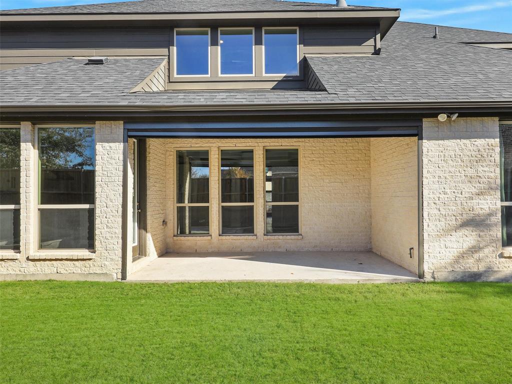 8473 Gerbera Daisy Road Frisco, TX 75035 - Photo 34 of 39 a view of front door of house