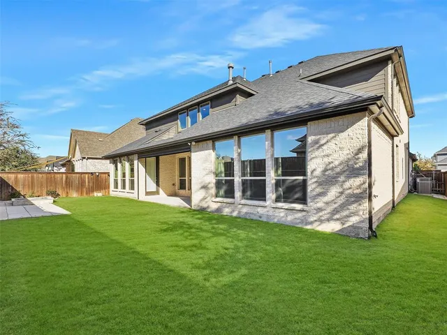a view of outdoor space with swimming pool and furniture