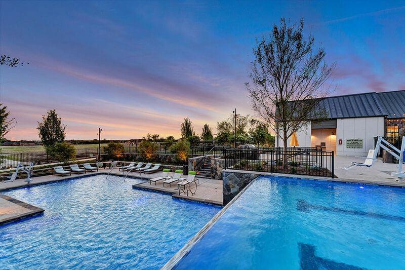 8473 Gerbera Daisy Road Frisco, TX 75035 - Photo 36 of 39 a view of a swimming pool with couches and lounge chairs