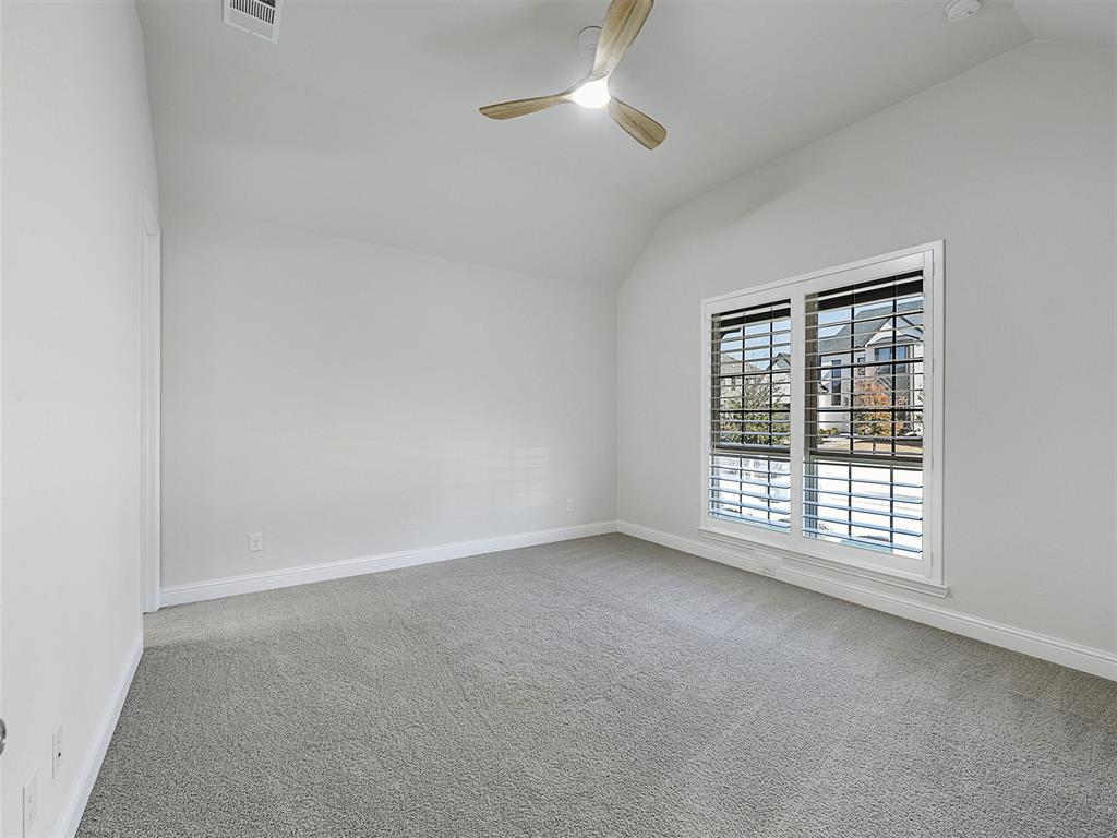 8473 Gerbera Daisy Road Frisco, TX 75035 - Photo 5 of 39 a view of an empty room with a window