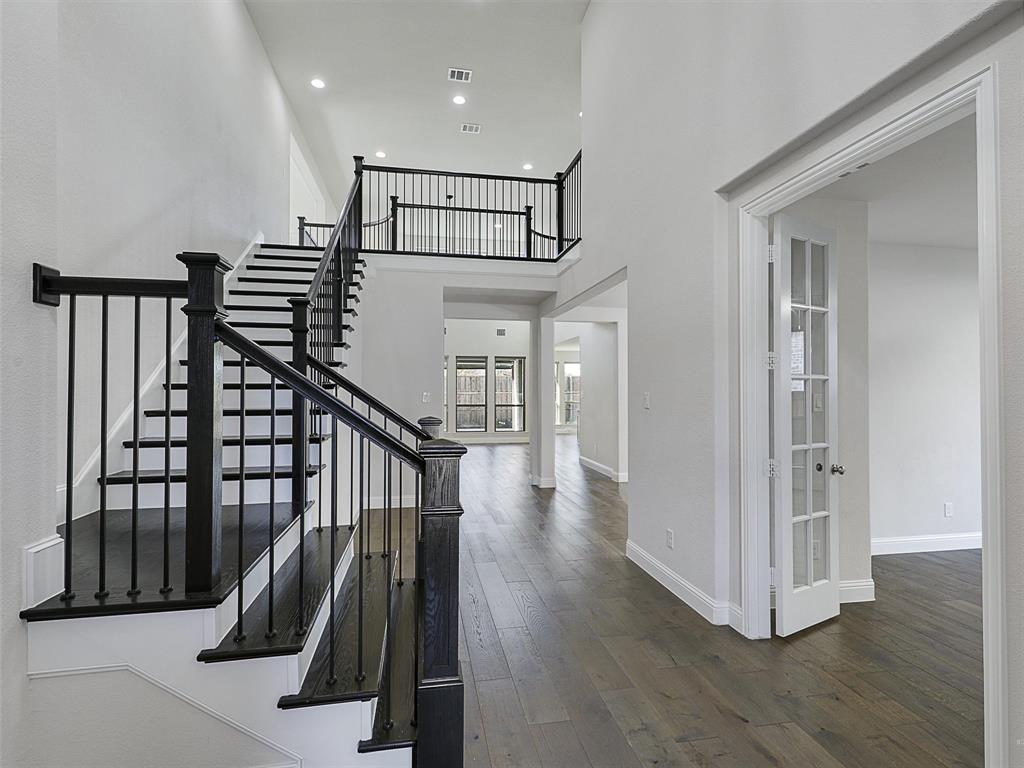 8473 Gerbera Daisy Road Frisco, TX 75035 - Photo 7 of 39 a view of entryway with wooden floor