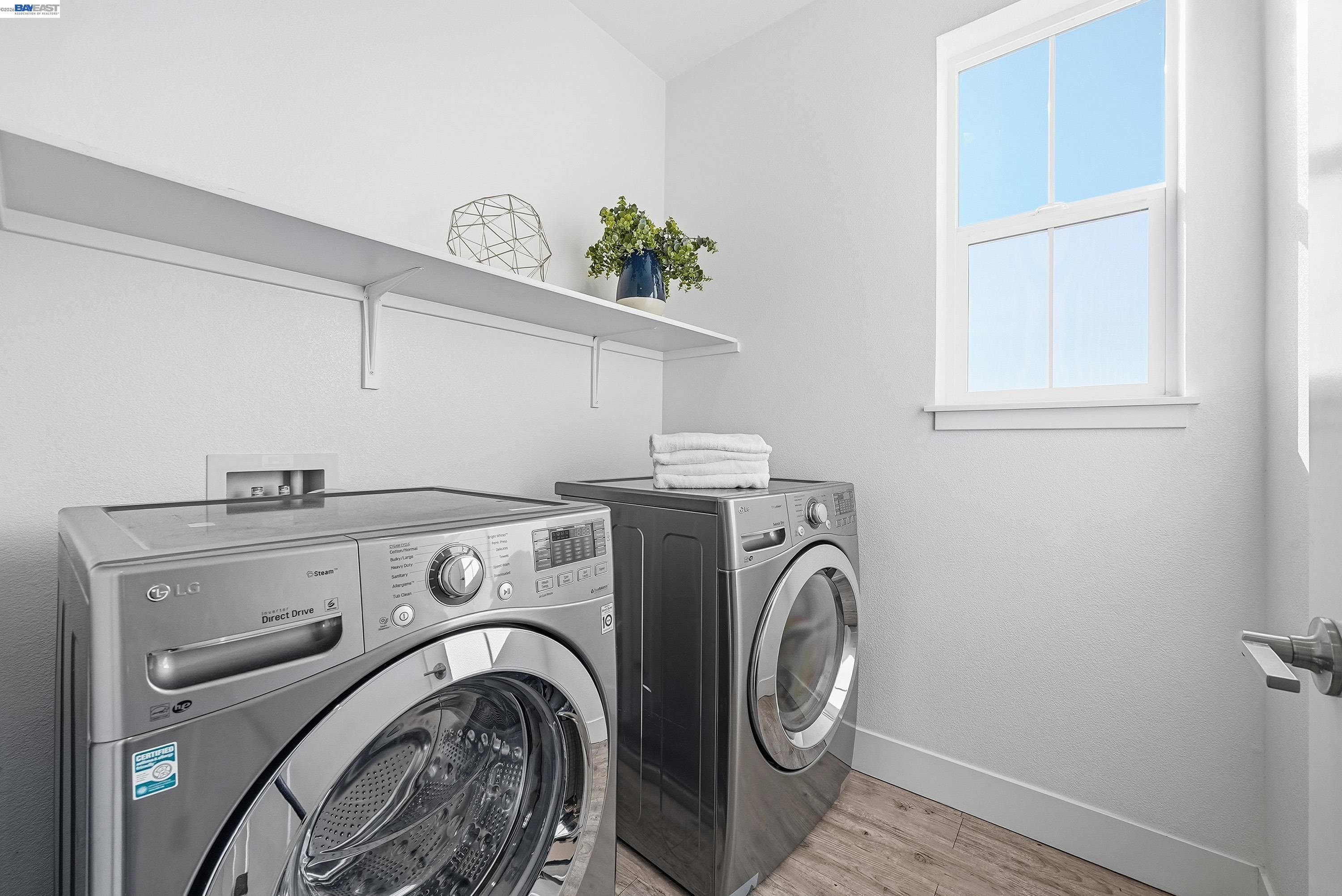 37645 Bay Crest Road Newark, CA 94560 - Photo 24 of 46 a utility room with dryer and washer