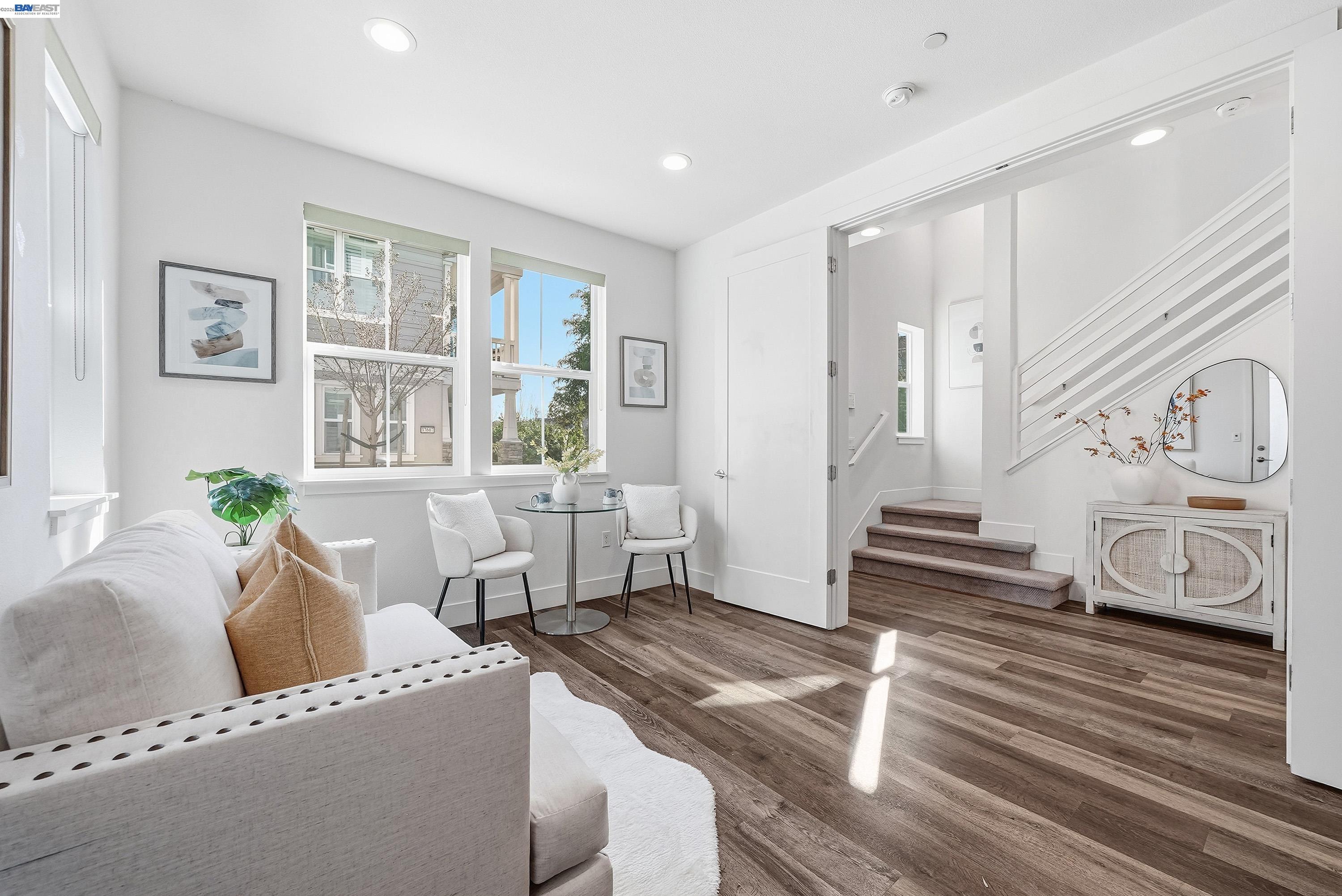 37645 Bay Crest Road Newark, CA 94560 - Photo 26 of 46 a living room with furniture and wooden floor