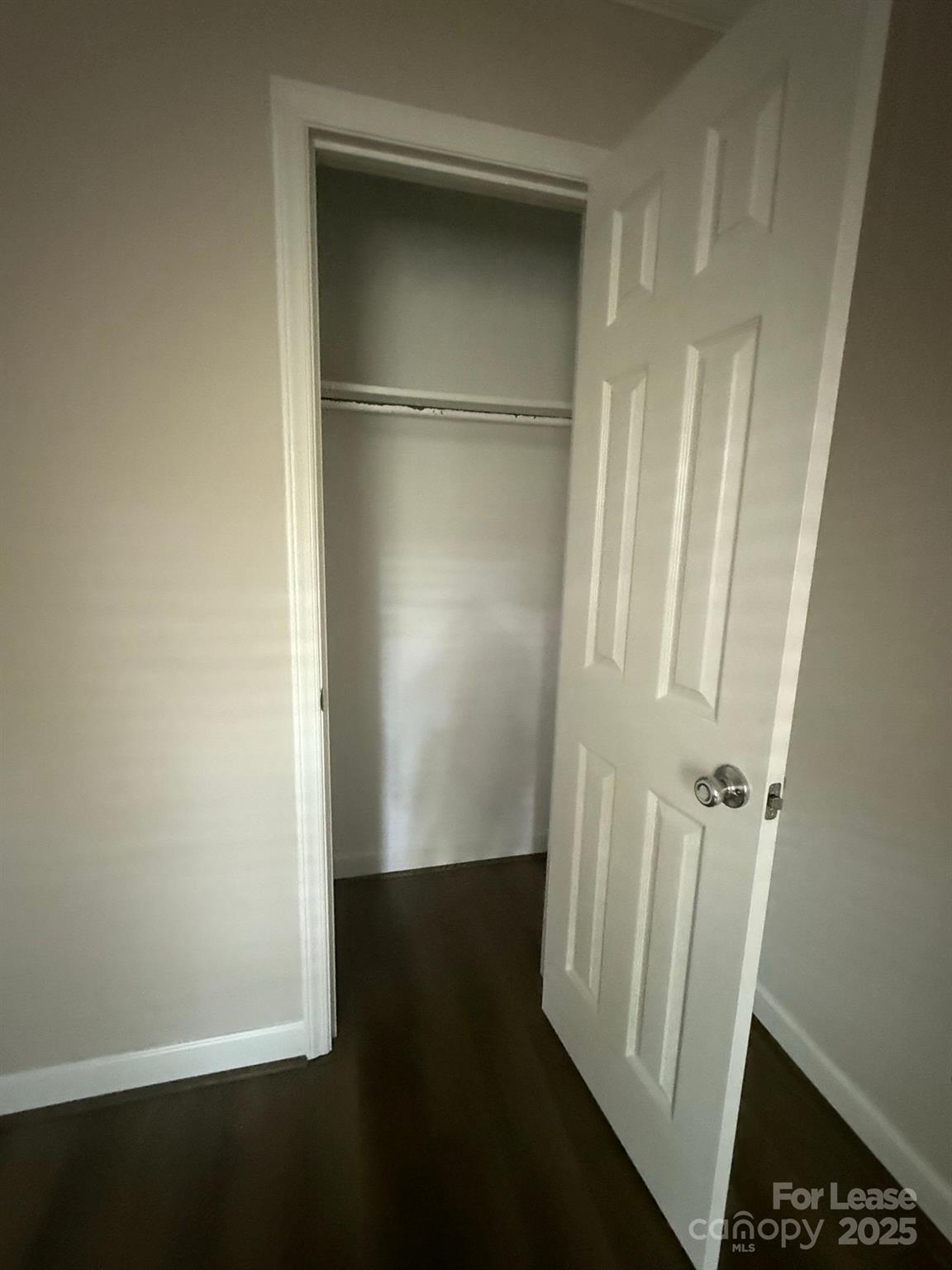 705 Oakshade Avenue Kannapolis, NC 28083 - Photo 5 of 21 an empty room with wooden floor