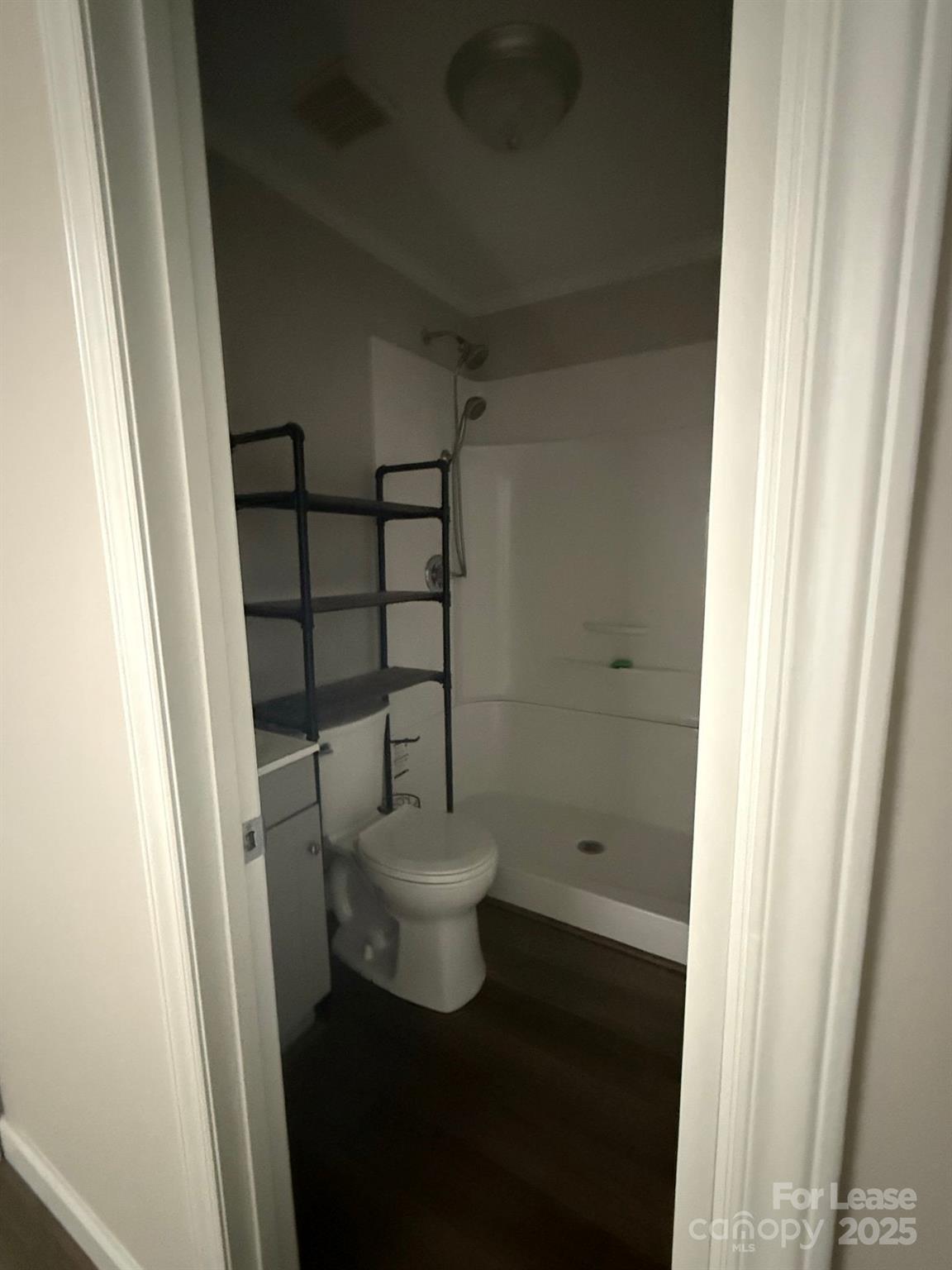 705 Oakshade Avenue Kannapolis, NC 28083 - Photo 10 of 21 a bathroom with a toilet and a shower