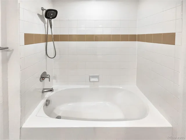 a bathroom with a bathtub