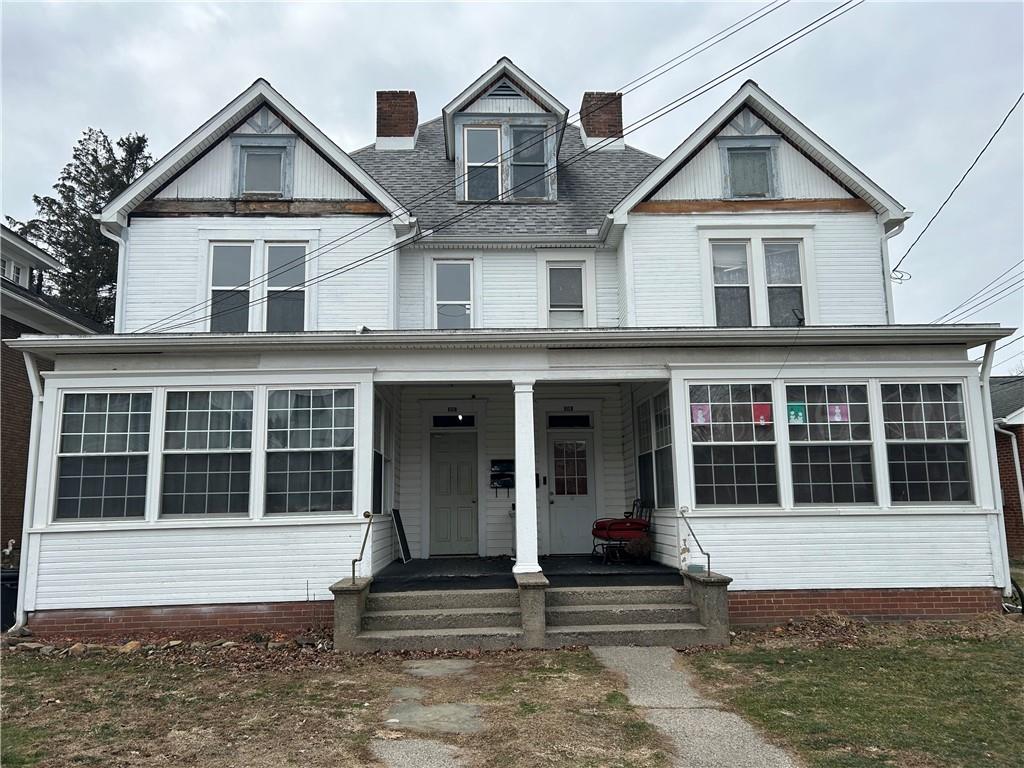 210 South Spring Street Blairsville, PA 15717 - Photo 1 of 15 a view of a large house with large windows