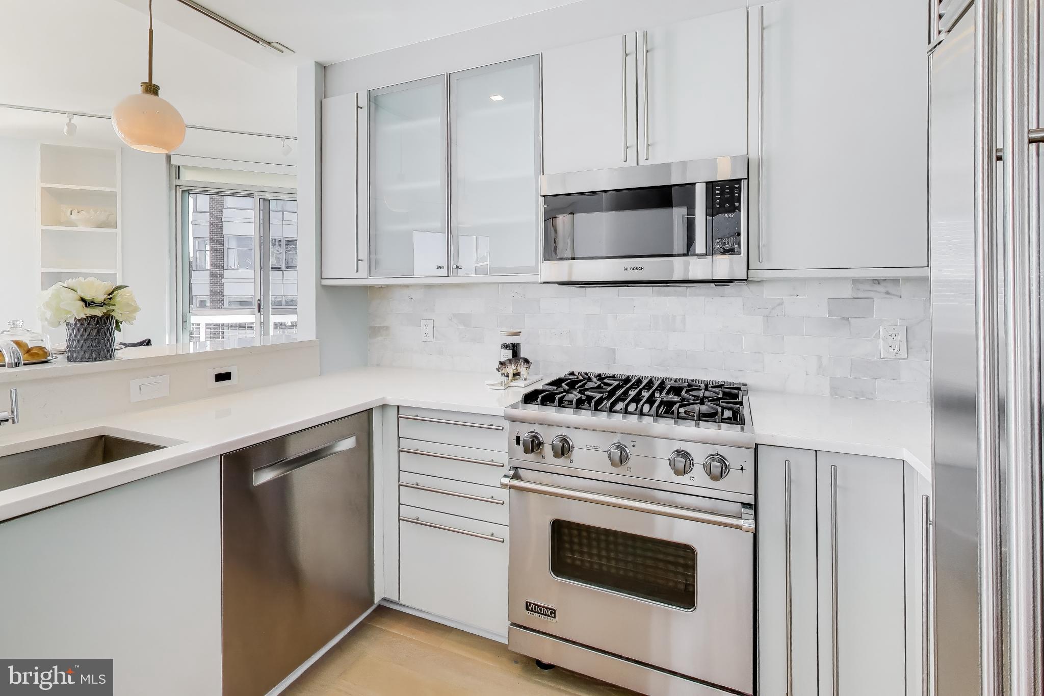 1300 13th Street Northwest, Unit 601 Washington, DC 20005 - Photo 12 of 35 Open kitchen with high end stainless appliances