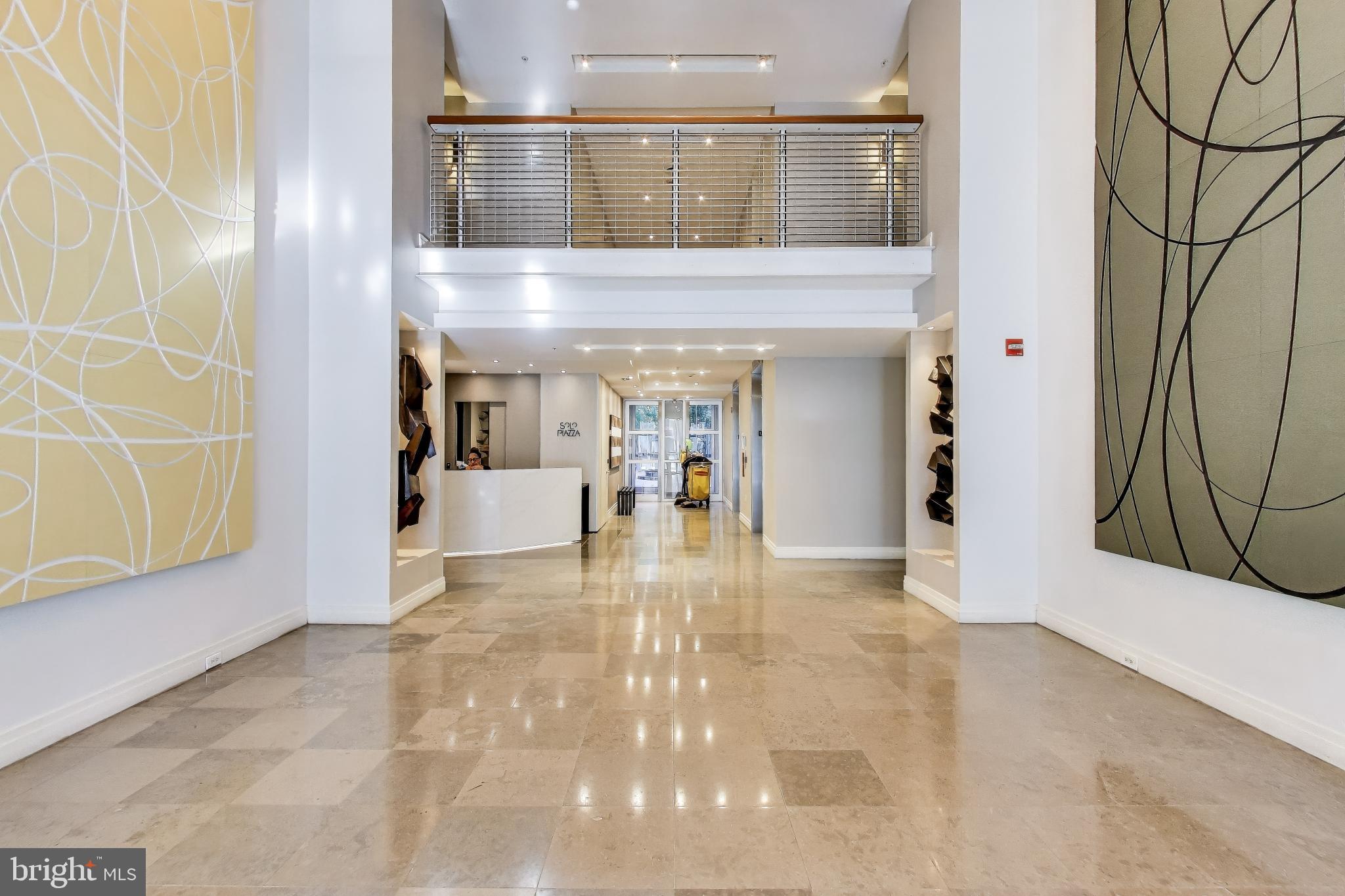 1300 13th Street Northwest, Unit 601 Washington, DC 20005 - Photo 2 of 35 Grand lobby with front desk concierge