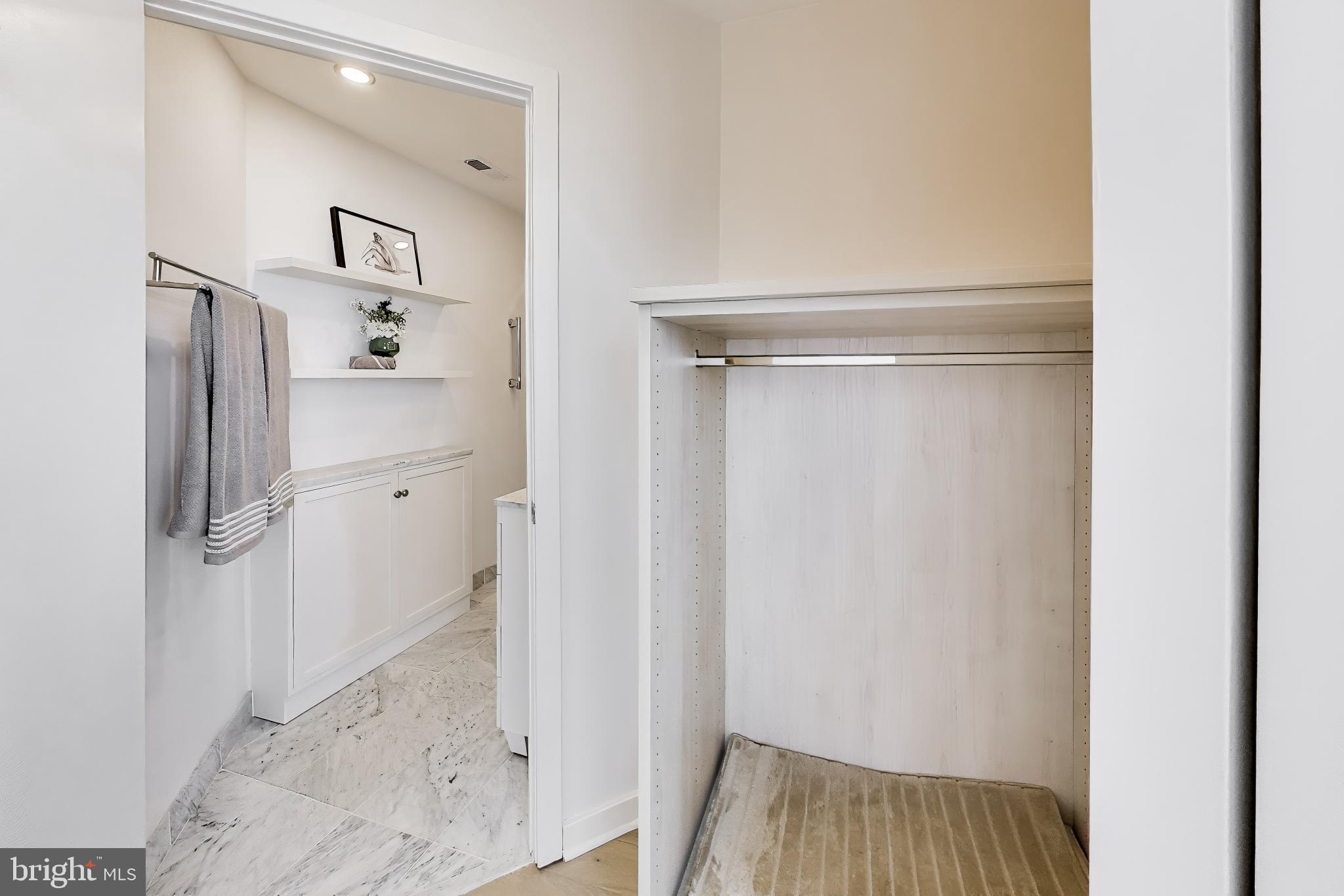 1300 13th Street Northwest, Unit 601 Washington, DC 20005 - Photo 24 of 35 Walkthrough closet and renovated 2nd bath