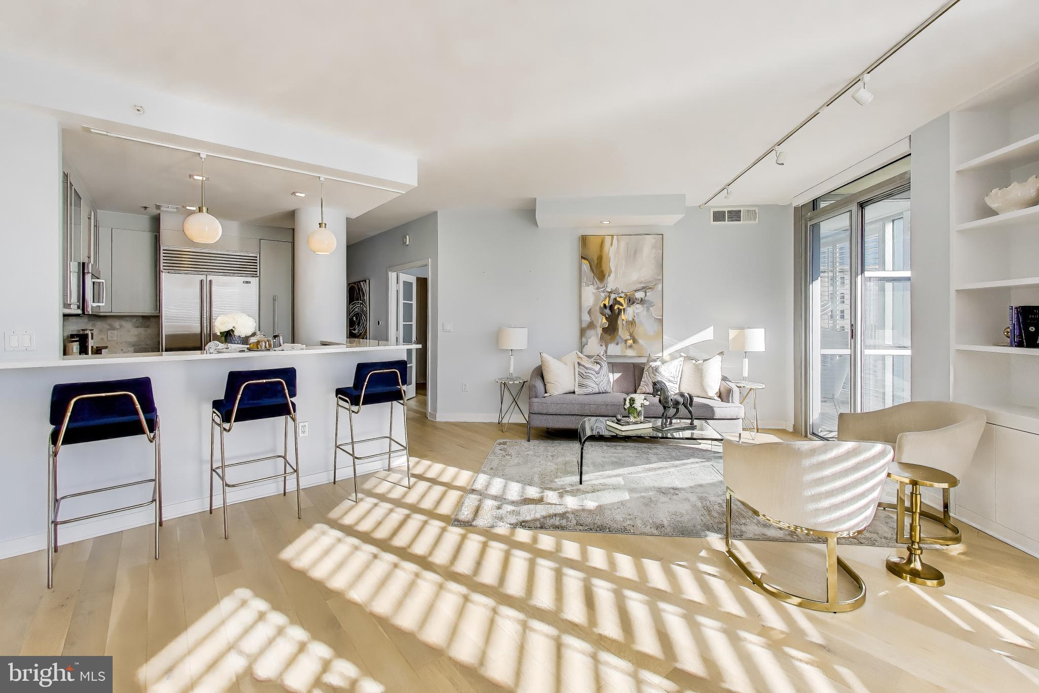 1300 13th Street Northwest, Unit 601 Washington, DC 20005 - Photo 7 of 35 Kitchen and bar space open to living area