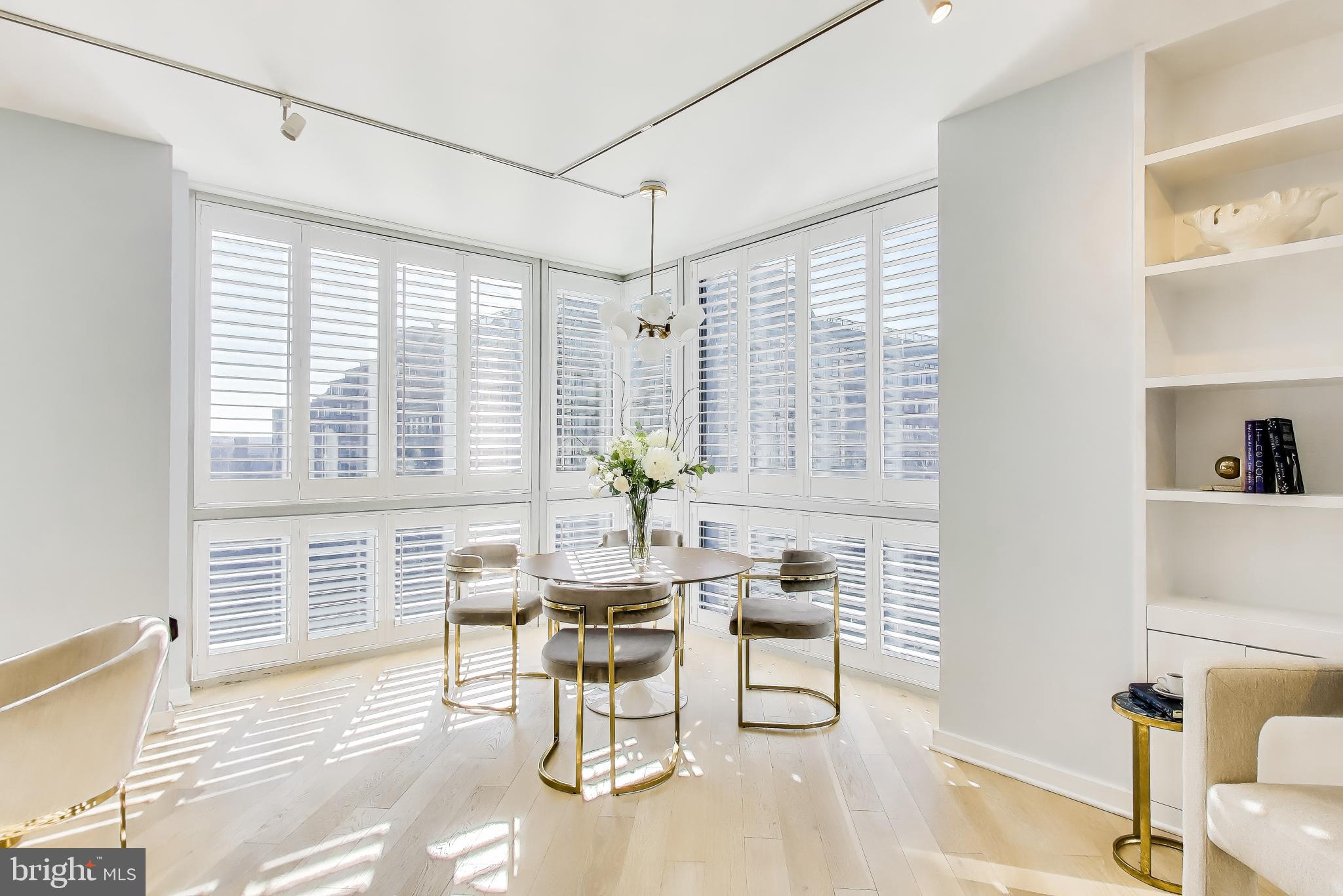 1300 13th Street Northwest, Unit 601 Washington, DC 20005 - Photo 9 of 35 Corner full of windows with dedicated dining space