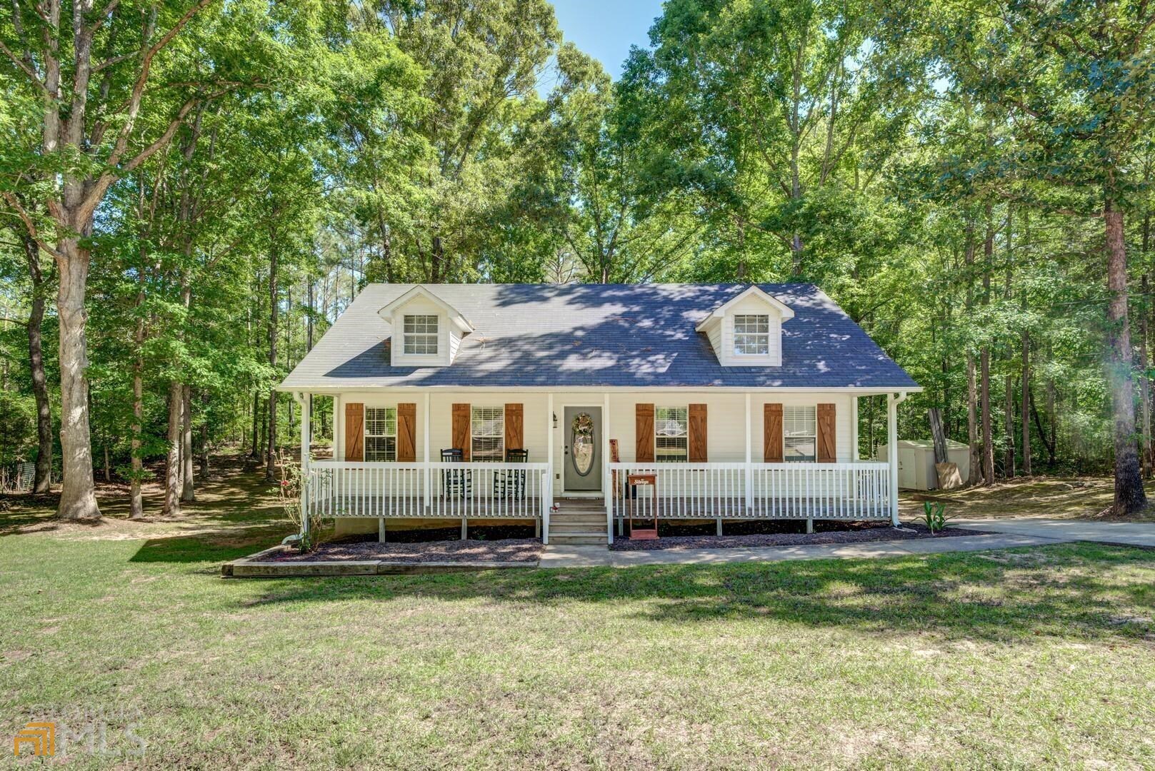 2369 Keys Ferry Road Jackson, GA 30233 - Photo 1 of 1 a front view of a house with a garden