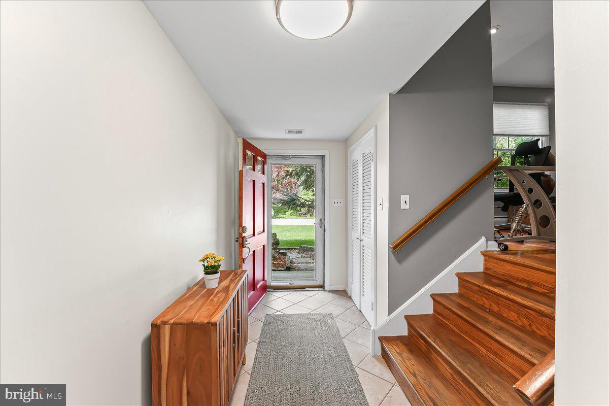 703 Blue Hill Road Wallingford, PA 19086 - Photo 10 of 39 a view of entryway with wooden floor