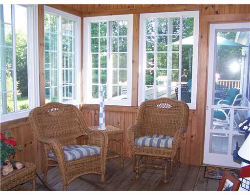 7 Fort Point Cove Road Stockton Springs, ME 04981 - Photo 13 of 21 Master Bedroom. Large sunroom off...