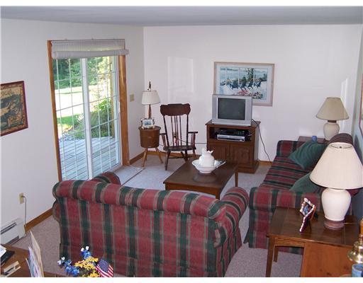 7 Fort Point Cove Road Stockton Springs, ME 04981 - Photo 15 of 21 Living Room. Lower level family room...