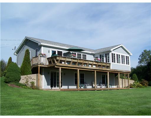 7 Fort Point Cove Road Stockton Springs, ME 04981 - Photo 3 of 21 Exterior Front. Water side of house....