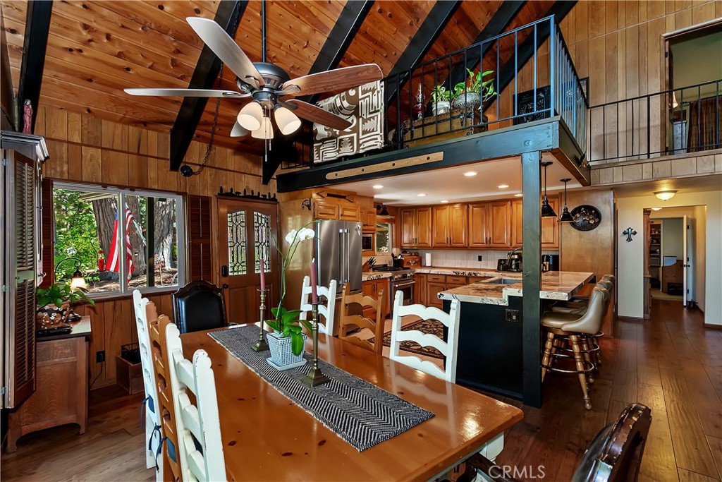 158 Golf Course Road Lake Arrowhead, CA 92391 - Photo 11 of 75 a view of a dining room with furniture window and wooden floor