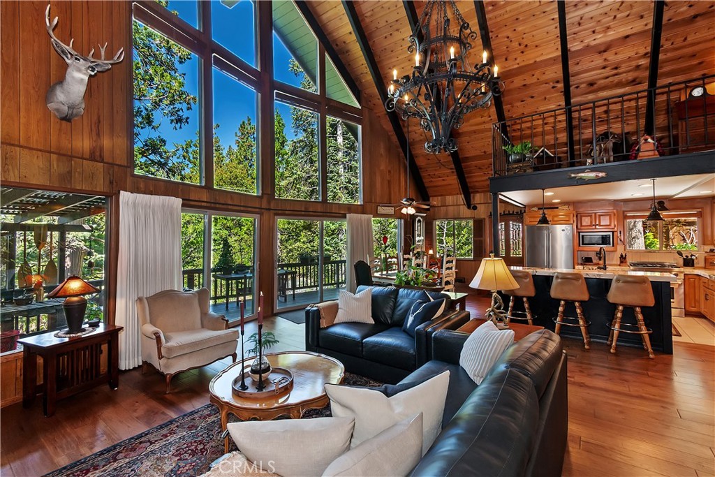 158 Golf Course Road Lake Arrowhead, CA 92391 - Photo 5 of 75 a living room with furniture and a large window