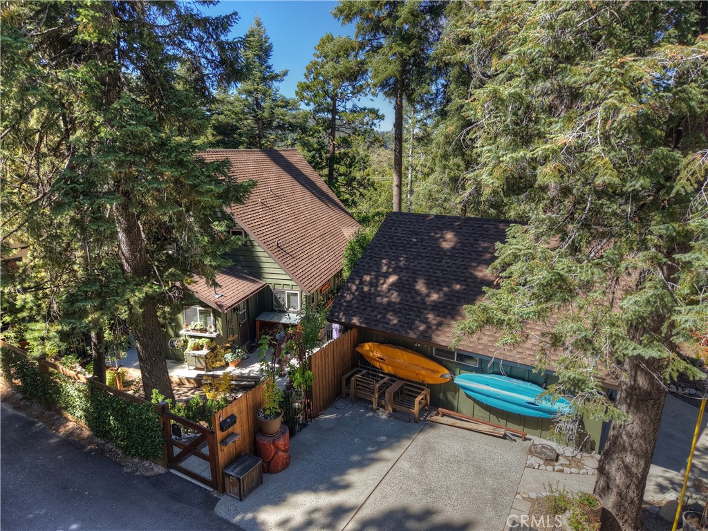 158 Golf Course Road Lake Arrowhead, CA 92391 - Photo 62 of 75 a bench is sitting in the middle of a park