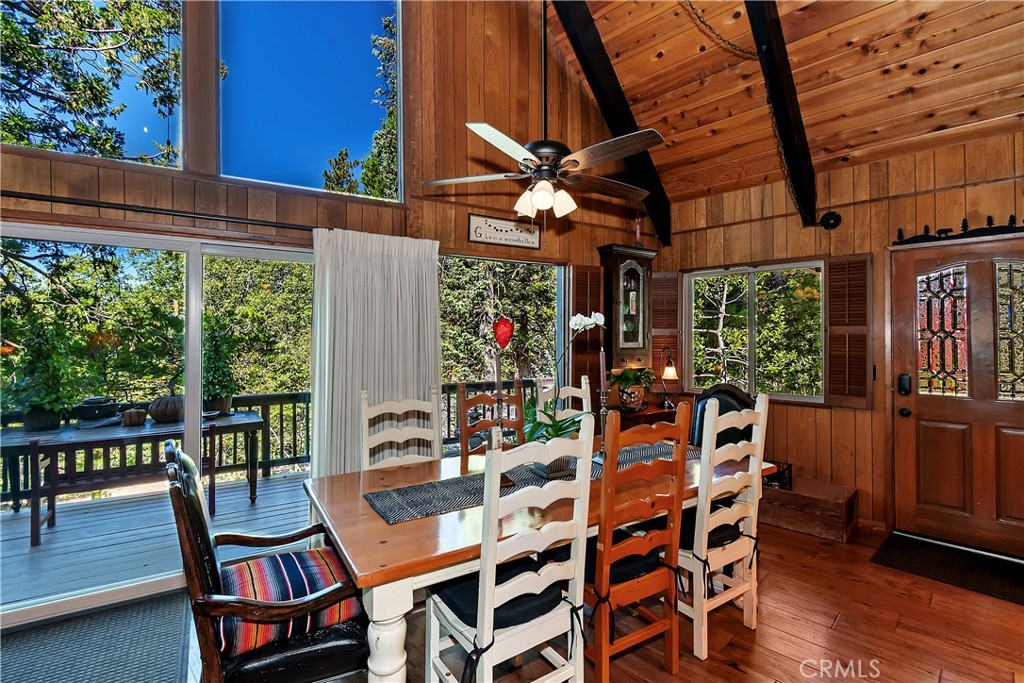 158 Golf Course Road Lake Arrowhead, CA 92391 - Photo 9 of 75 a view of a chairs and table in the patio