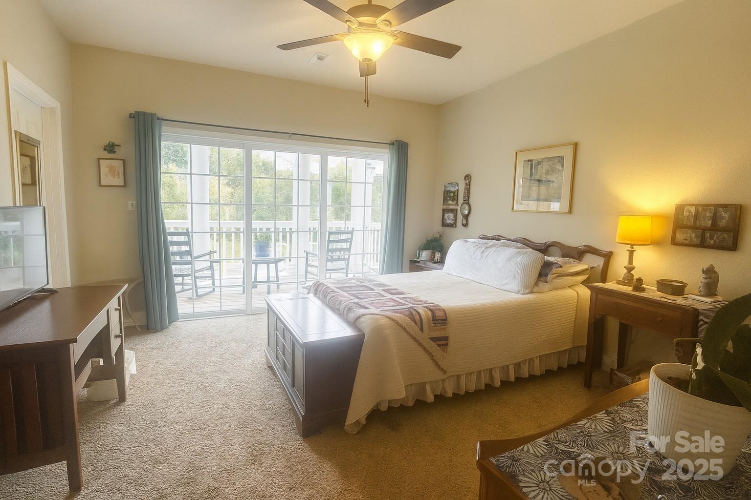1350 21st Avenue Northeast Hickory, NC 28601 - Photo 18 of 27 a spacious bedroom with a bed and wooden floor