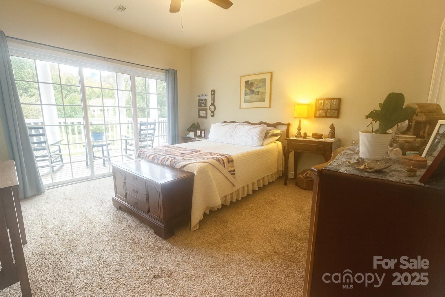 1350 21st Avenue Northeast Hickory, NC 28601 - Photo 19 of 27 a spacious bedroom with a bed and wooden floor