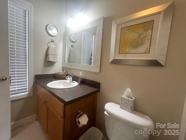 1350 21st Avenue Northeast Hickory, NC 28601 - Photo 21 of 27 a bathroom with a toilet sink and mirror
